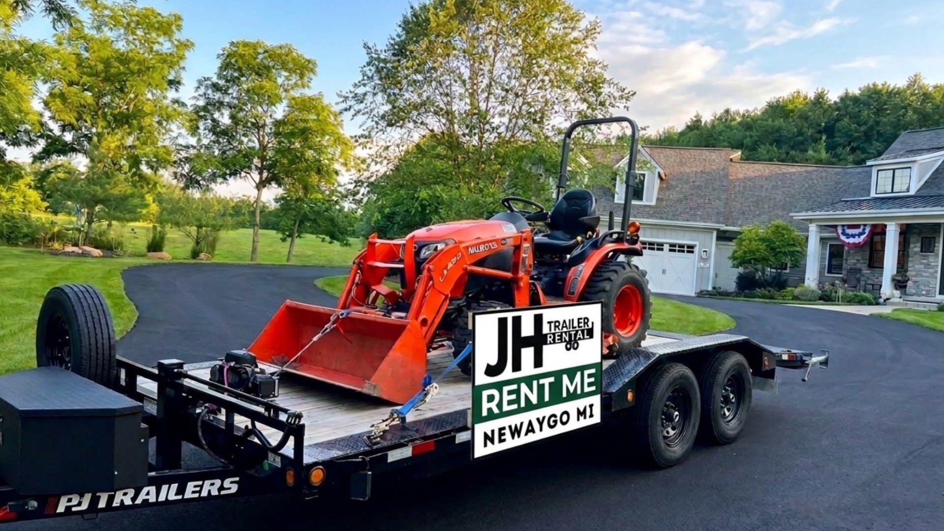 JH Trailer Rental car hauler carrying an orange compact tractor